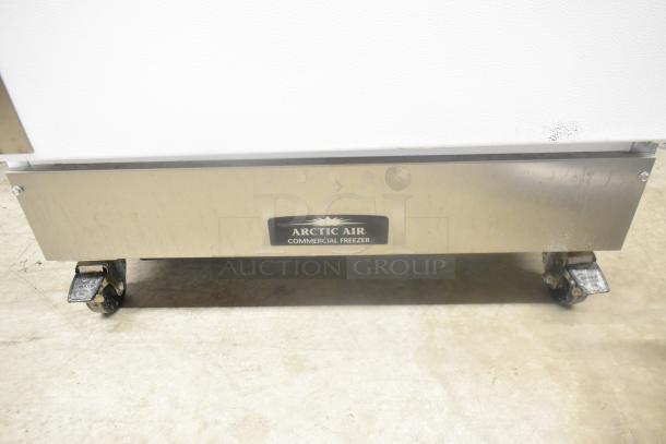 Arctic Air F22CWF3 freezer with commercial casters, 115 volts, 1 phase. Visible logo reads "Arctic Air Commercial Freezer."