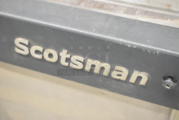 Scotsman C0530SW-1A stainless steel ice head, features visible brand logo, 115 volts, 1 phase. Commercial use.