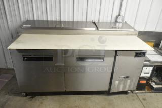 Yukon YPP71 stainless steel commercial pizza prep table with cutting board, two compartments, on casters. 115 volts, 1 phase.