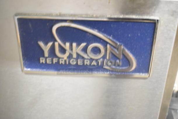 Yukon YPP71 stainless steel commercial pizza prep table with casters, 115V, 1 phase. Yukon Refrigeration logo visible.