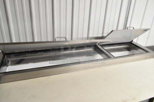 Yukon YPP71 stainless steel pizza prep table, commercial casters, 115V, 1 phase, dual compartment design, used condition.