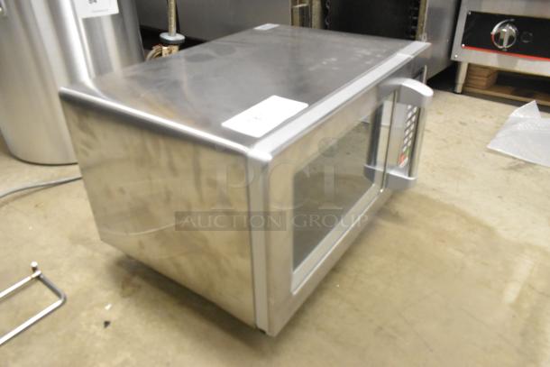 Winco EMW-1000ST stainless steel commercial countertop microwave oven, 120 volts, 1 phase, in good condition.
