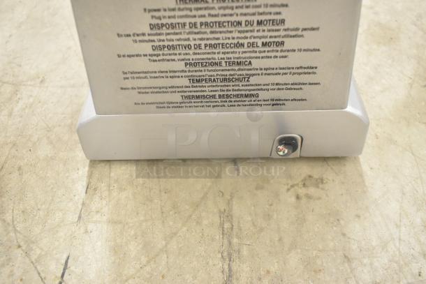 Waring WWCM180 metal countertop waffle cone maker, 120 volts, 1 phase. Instruction label visible on base.