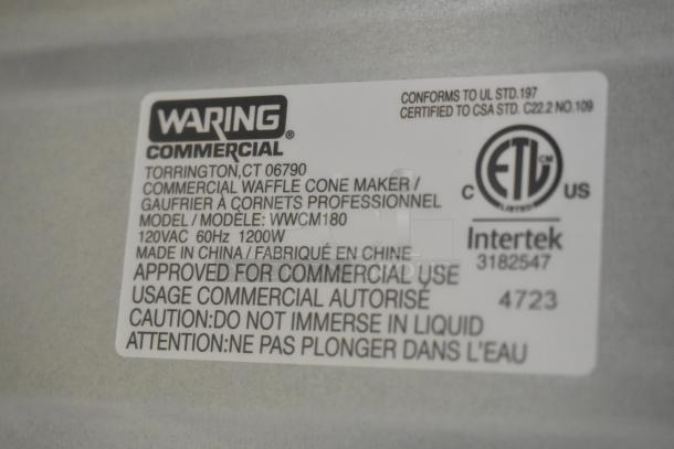 Waring WWCM180 Metal Countertop Waffle Cone Maker, 120 Volts, model label showing commercial approval and safety warnings.