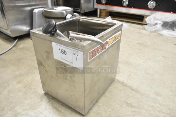Winco PKTS-2D stainless steel condiment rail with pump; labels show "ketchup," "mustard"; minor surface wear.