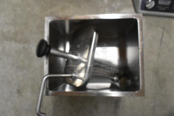 Winco PKTS-2D stainless steel countertop condiment rail with 1 pump; clean, good condition, ideal for kitchen use.