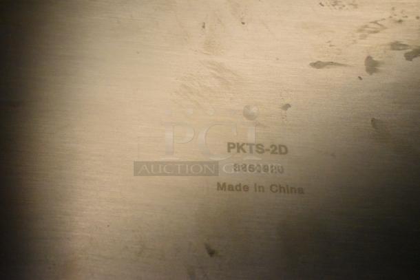Winco PKTS-2D stainless steel condiment rail detail, model number and "Made in China" label visible.
