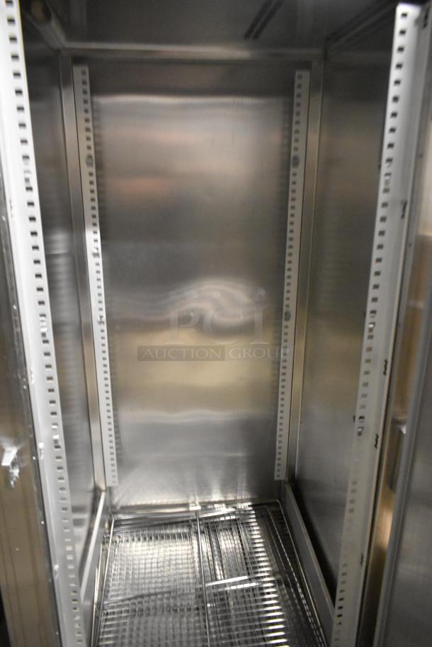 Traulsen RRI 1-32LPUT stainless steel commercial reach-in cooler interior, pristine condition, single door, 115V, 1 phase.