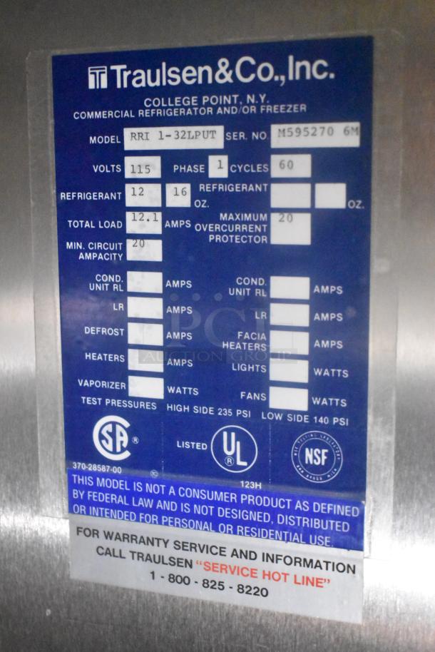 Traulsen RRI 1-32LPUT stainless steel commercial cooler label, 115 volts, 1 phase, NSF certified, warranty info included.