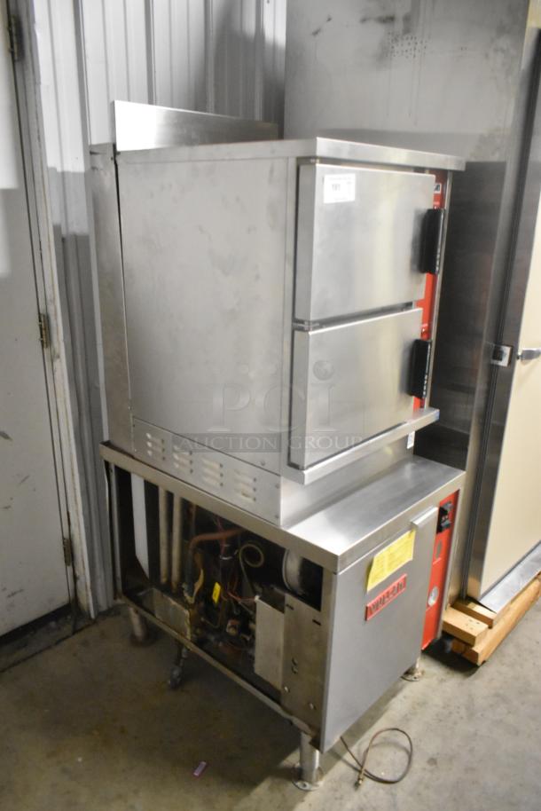Vulcan VHX24G-AAP stainless steel commercial steam cabinet, 2-deck, 270,000 BTU, natural gas, visible piping, used condition.