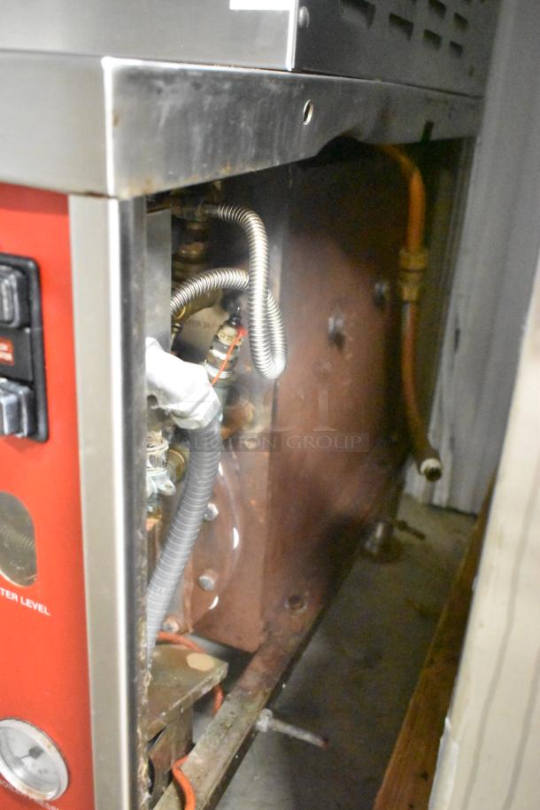 Vulcan VHX24G-AAP stainless steel commercial steam cabinet, 2 deck, natural gas, 270,000 BTU, slightly used condition.