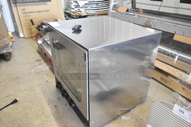 Brand new Vollrath COV-208240-HS stainless steel half-size countertop convection oven with visible scratch and dent.