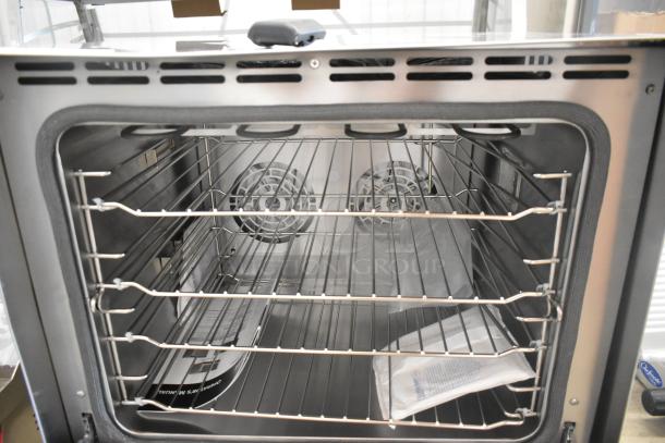 Brand new Vollrath COV-208240-HS half size countertop convection oven, stainless steel, 208-240V, 1 phase, interior view.