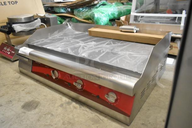 Brand new Avantco 177EG30N stainless steel flat top griddle, electric, 208/240V, 1 phase, minor scratches, with controls.