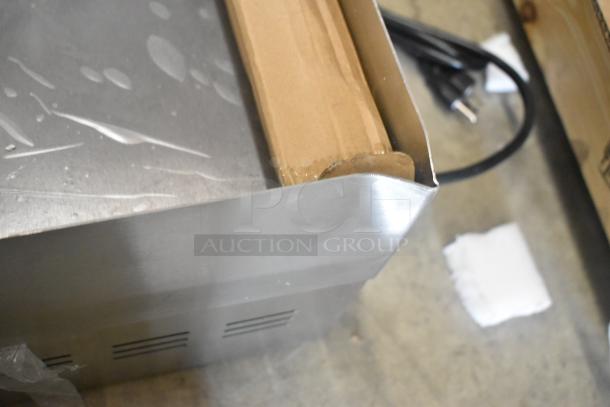 Brand new Avantco 177EG30N stainless steel griddle, electric, 208/240V, 1 phase, scratch and dent, visible corner dent.