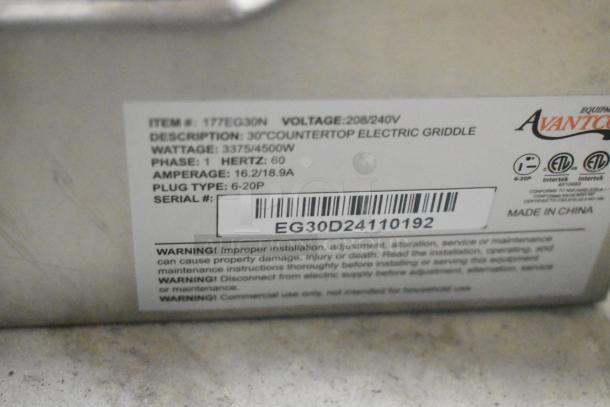 Alt Text: Avantco 177EG30N stainless steel commercial flat top griddle label showing voltage, wattage, model, and warnings.