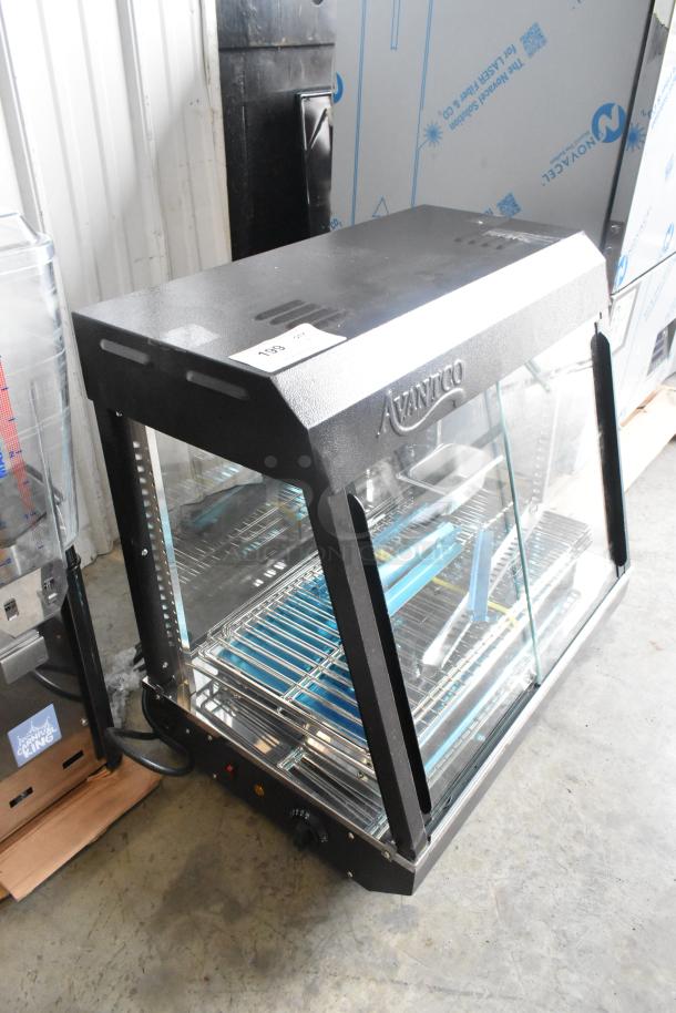 Brand new Avantco 177HDC26 heated display case, 26", with sliding doors, 3 shelves, minor dents, 120V, 1 phase.