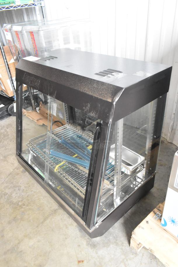 New Avantco 177HDC26 26" countertop heated display case. Features 3 shelves, sliding doors. Scratch and dent condition.
