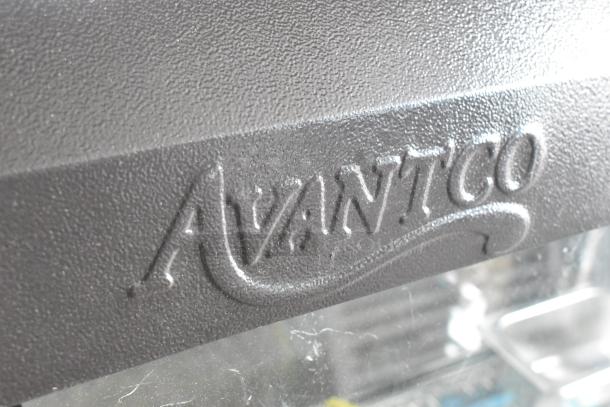 Alt text: Close-up of Avantco logo on the 177HDC26 heated display case. 2024 model, scratch and dent, 3 shelves, sliding doors.