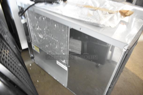 Brand new Avantco 194MCF430A ice machine, 397 lb. capacity. Minor dents visible on exterior. 115V, 1 Phase.