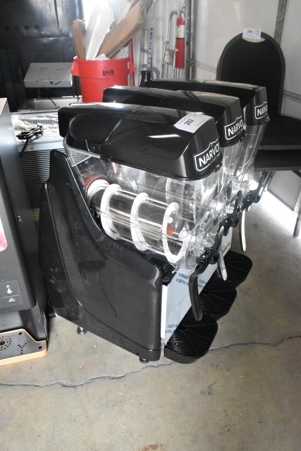 Brand new Narvon NSSM3 slushie machine with 3 hoppers, stainless steel, 115 volts, showing minor scratches and dents.