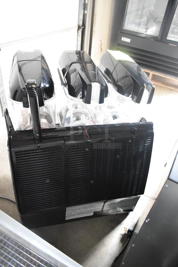 Brand new Narvon NSSM3 stainless steel commercial slushie machine with 3 hoppers. 115V, 1 phase, some scratches and dents.