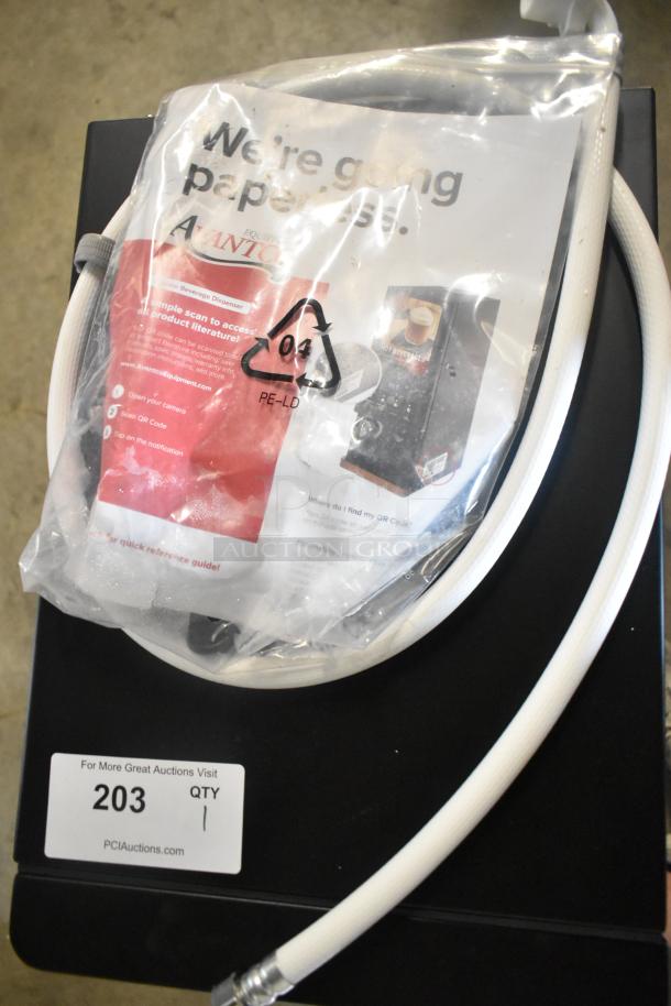Brand new Avantco 177PBD3 cappuccino machine, 3.7 lb. hoppers, 120V, with tags and hoses, in original packaging.