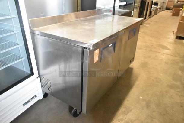 True TWT-60F stainless steel commercial 2-door worktop freezer on casters, 115V, 1 phase, excellent condition.