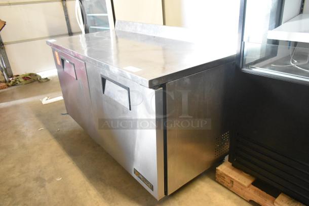 True TWT-60F commercial stainless steel 2-door worktop freezer on casters, 115V, 1 phase, in good condition.