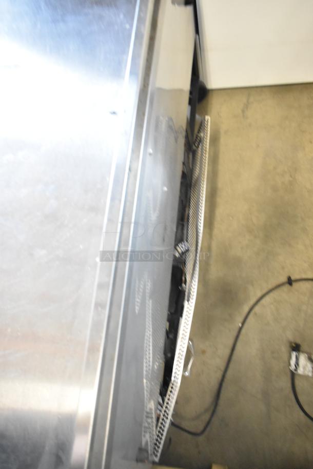 True TWT-60F stainless steel commercial 2-door work top freezer on casters. 115 volts, 1 phase. Clean condition, minor wear.