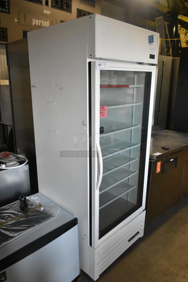 2021 True TSCI-600R-G-PH commercial single door reach-in cooler with poly coated racks, 115V, 1 phase, excellent condition.