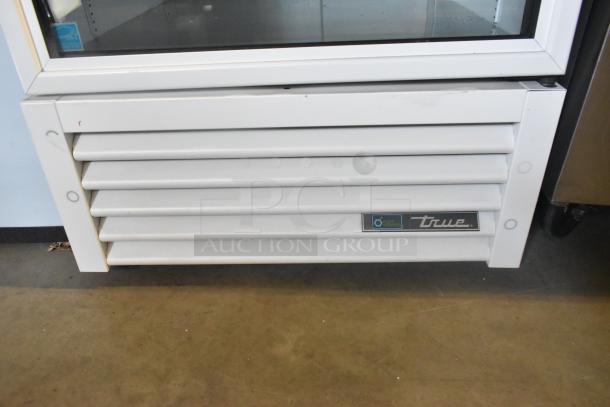 2021 True TSCI-600R-G-PH single door cooler, metal body, poly-coated racks, 115V, 1 phase, natural refrigerants label.