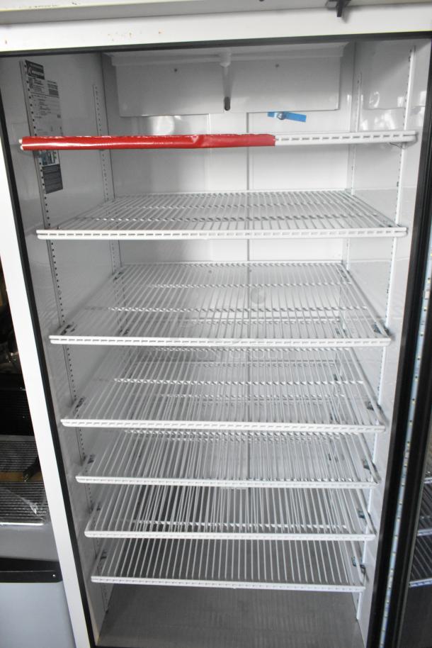 2021 True TSCI-600R-G-PH commercial cooler, single door, metal, poly-coated racks, 115V, 1 phase, excellent condition.