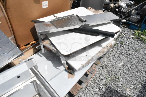 10 various items including stainless steel shelves, tabletop, Regency 64" NSF shelving post on wooden pallets, mixed condition.