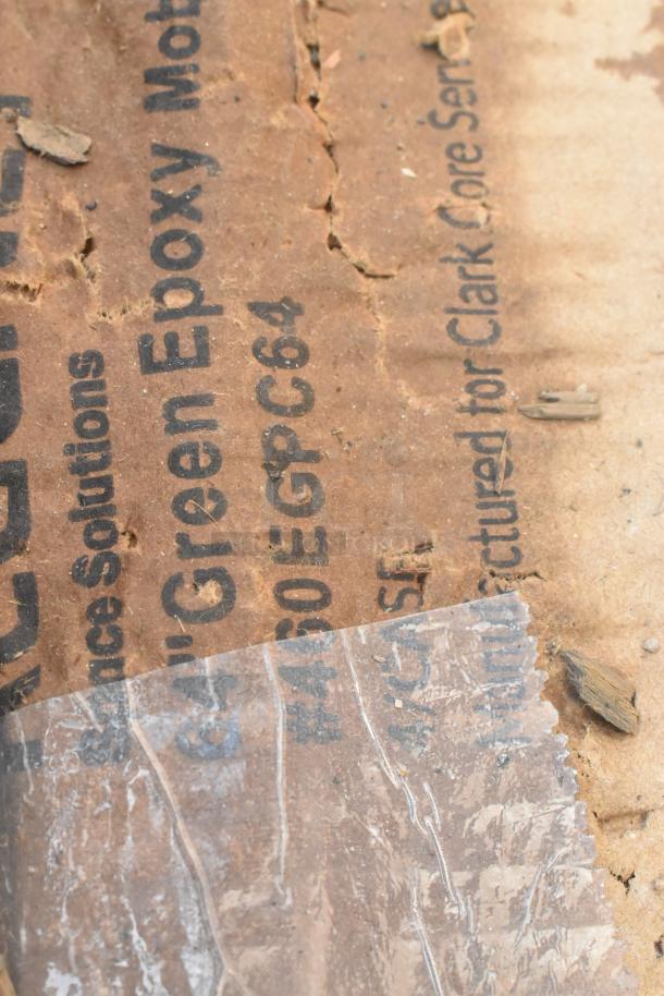 Label on cardboard showing "460EGPC64" and "NSF Green Epoxy Mobile Shelving Post." Used condition, visible wear.