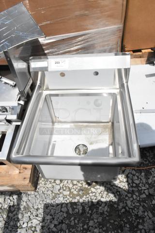 Brand new Steelton 522CS11818N stainless steel single bay sink with scratches and dents. Includes mounting holes.