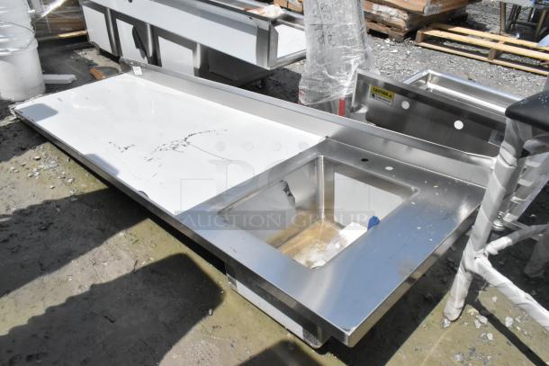 Brand new Regency 600ST3096R 30"x96" stainless steel work tabletop with right sink. Scratch and dent. No legs included.