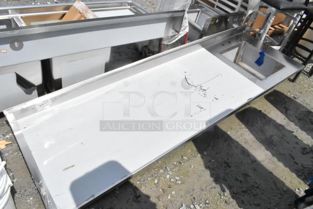 Brand new Regency 600ST3096R stainless steel work tabletop with sink on right, 30" x 96", 16 gauge, scratch and dent.