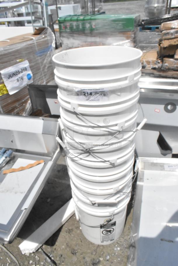8 scratch and dent RG5700 white poly 5-gallon buckets, brand new; stacked with visible labels and metal handles.