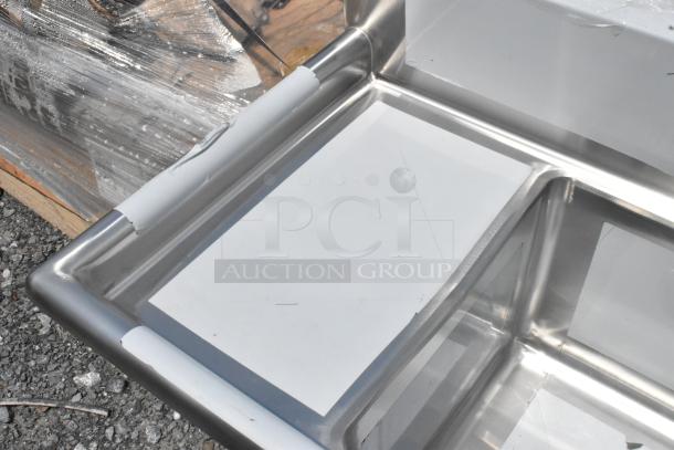 BRAND NEW Regency 600S31416212 stainless steel 3 bay sink with dual drain boards, scratch and dent, no legs included.