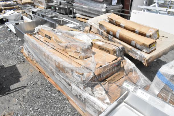 Pallet of 6 new items, including a Regency stainless steel work table, Steelton shelf kit, and Galaxy canopy tent, wrapped for auction.