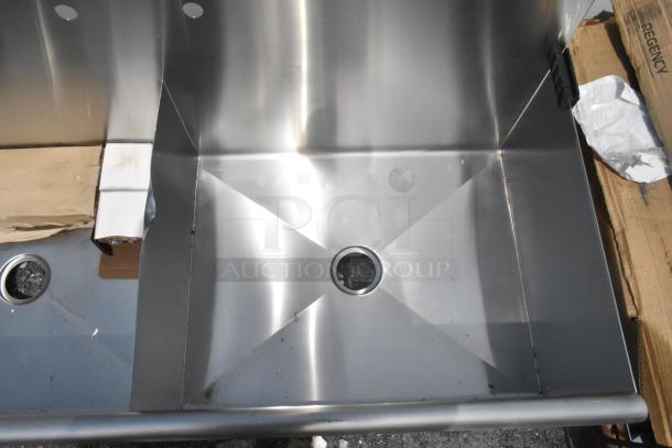 Brand new Regency 600S23024SB 30"x24"x14" utility sink with two compartments. Scratch and dent condition. No legs included.