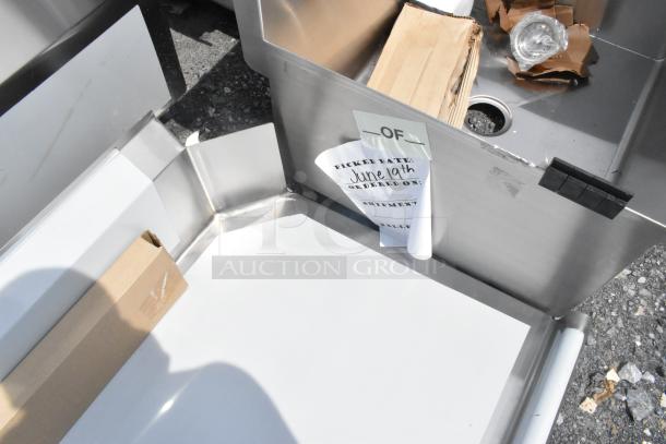 BRAND NEW Regency 600CDT60L 16 Gauge 5' Clean Dish Table with left drainboard, visible scratch and dent, marked for June 19th.