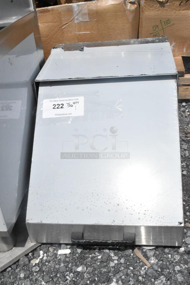 Brand new stainless steel mega top lid with visible scratches and dents. White label shows lot number 222 and auction date.