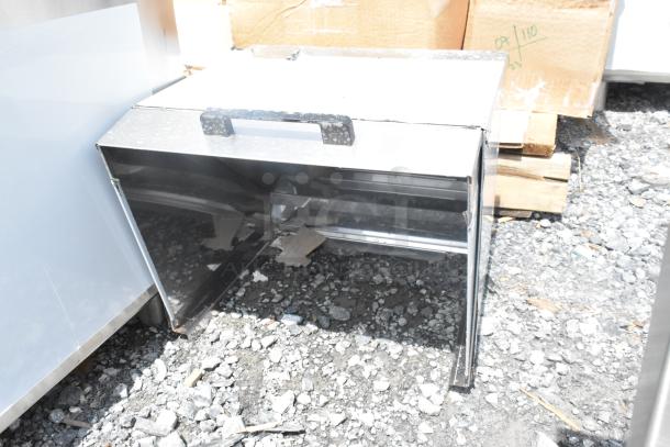 Brand new scratch and dent stainless steel mega top lid, visible dents on corners, ideal for commercial use.