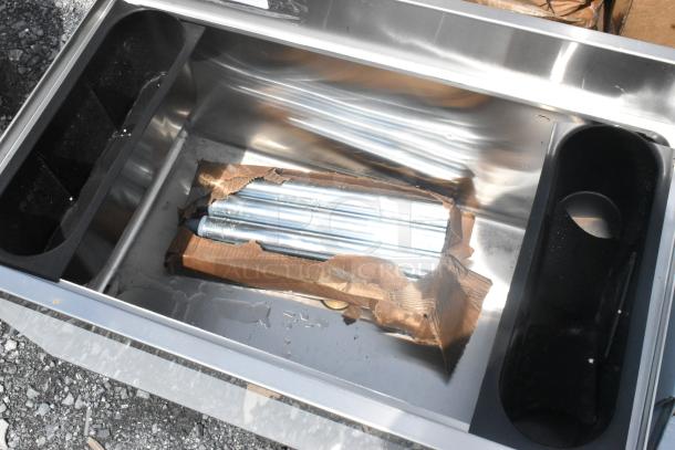 Regency 600IB1830 18"x30" underbar ice bin, 98 lb capacity. New with scratch and dent marks, includes galvanized legs.