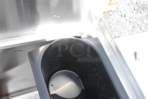 Brand new Regency 600IB1830 underbar ice bin, 18" x 30", 98 lb capacity. Scratch and dent condition, visible marks.