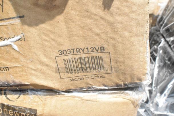 Cardboard box with barcode "303TRY12VB," labeled "Made in China." Contains trays, organizer, platters, and schooner.