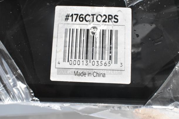 Barcode label on black item, marked #176CTC2RS, indicating "Made in China," wrapped in plastic, part of a scratch and dent sale.