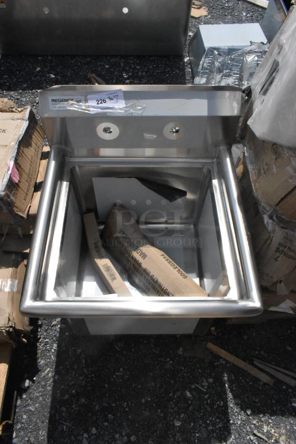 Brand new Regency 600S11818 stainless steel commercial sink, 23" size, with 18"x18"x14" bowl, galvanized legs, without drainboard.